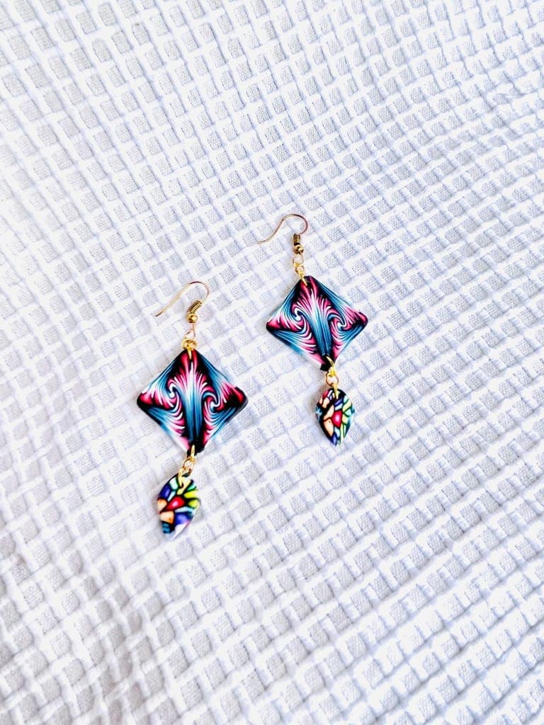 Leo handcrafted clay earrings view 2