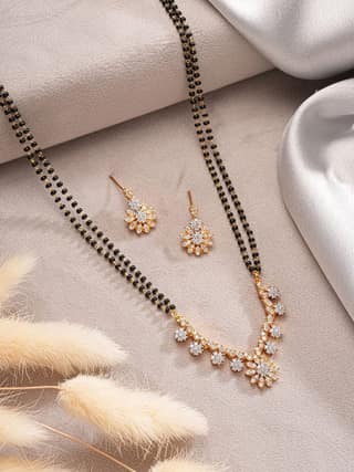 Gold Toned AD Studded Black Beads Studded Designer Floral Mangalsutra Jewellery Set