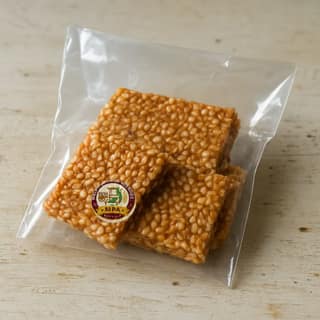 Malamma Pangi Agencies's til chikki (sesame brittle)