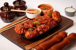 Veg Schezwan Pan Fried Momos [6Pcs]