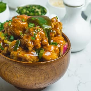 Chicken in plum sauce (12 pcs)