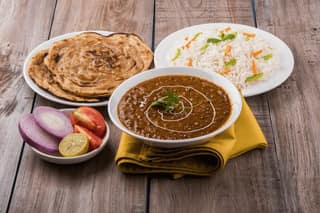 Dal makhani and rice/ laccha paratha(1pc)