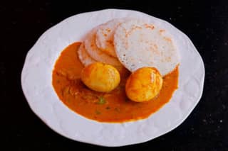 3 Kallapam With Egg Curry And A Soft Drinks