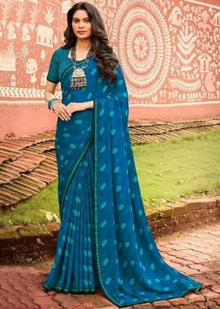 Blue Color Georgette Saree With Fancy Border And Raw Silk Blouse Piece