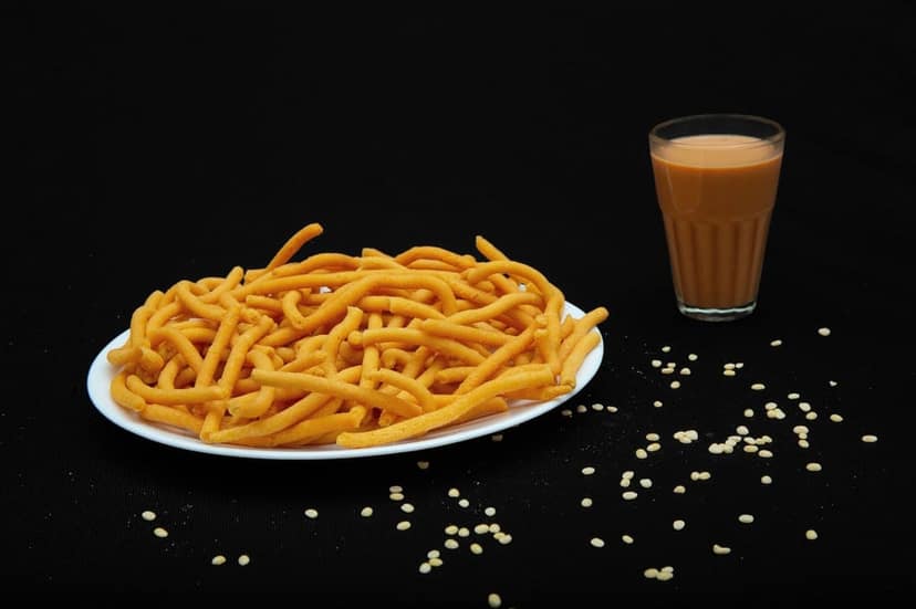 TruMillets Kodo Millet Thenkuzhal 125g | Authentic South Indian Snack | Crunchy & Tasty Thengol | No Palm Oil | Ready-to-Eat | Healthy & Wholesome Millet Snack view 3