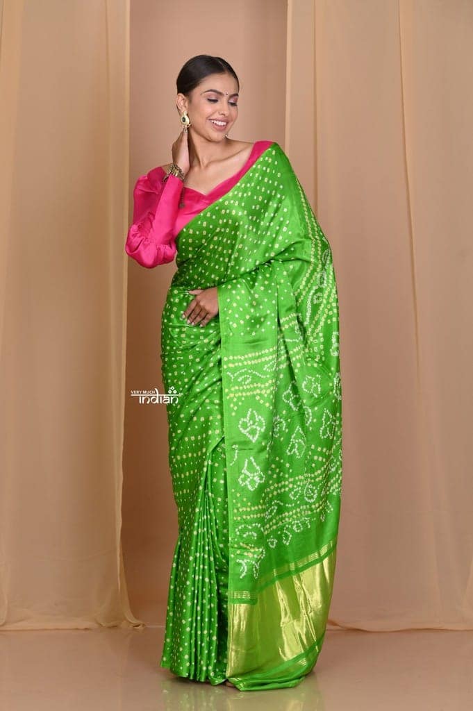 Pehal~ Traditional Blade Green Gajji silk Saree with Golden Bandhani Weave.