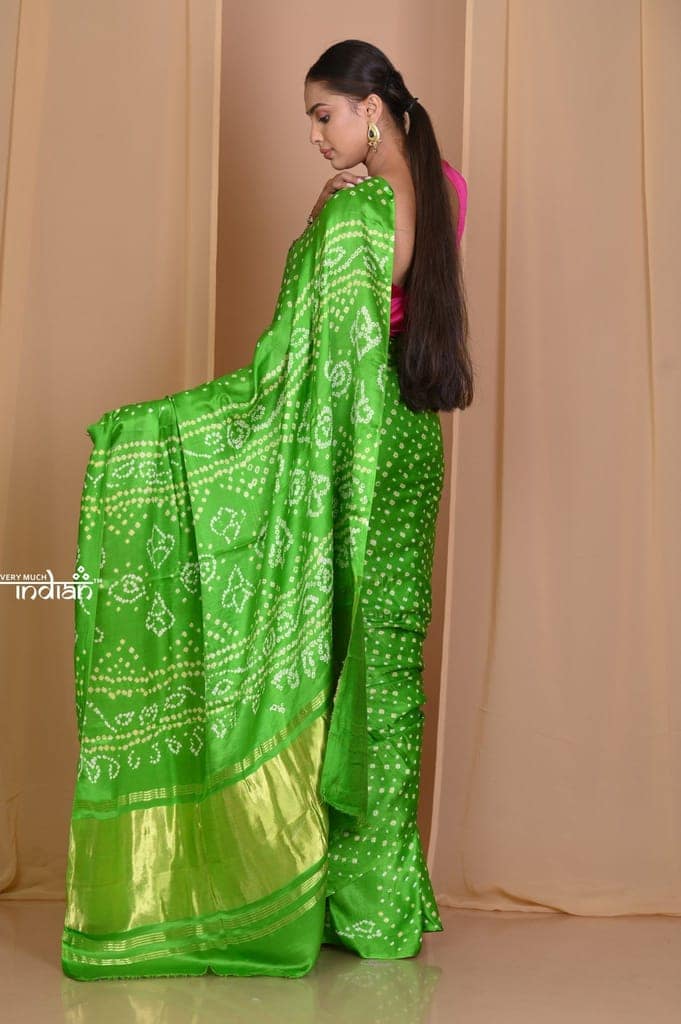 Pehal~ Traditional Blade Green Gajji silk Saree with Golden Bandhani Weave. view 3