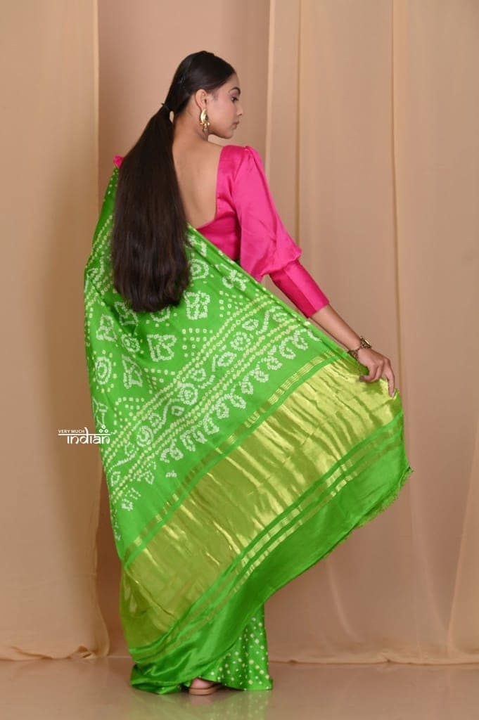 Pehal~ Traditional Blade Green Gajji silk Saree with Golden Bandhani Weave. view 4