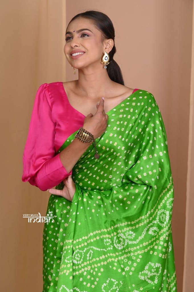 Pehal~ Traditional Blade Green Gajji silk Saree with Golden Bandhani Weave. view 5