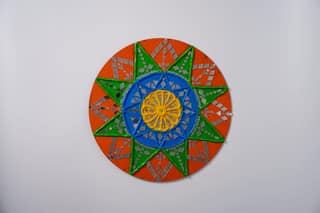 Lippan art, also known as mud and mirror work, which is a traditional mural craft