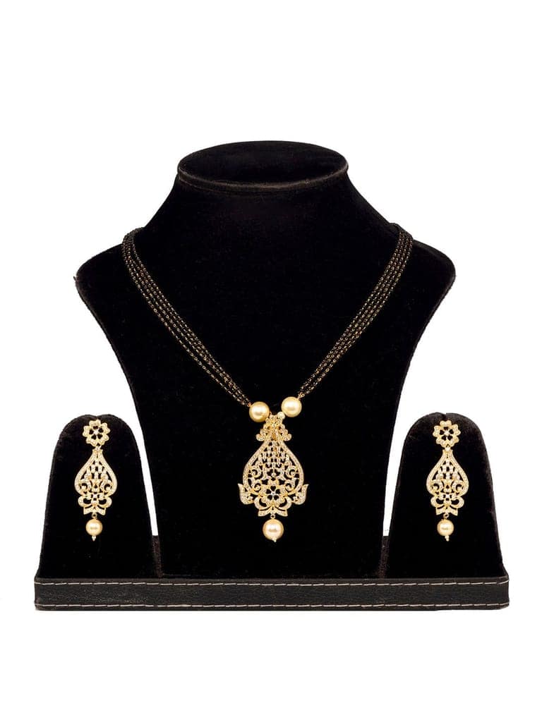 Gold Plated White AD and Pearl studded Antique Pendant Necklace Black Beads Pearl Mala and Earrings view 7