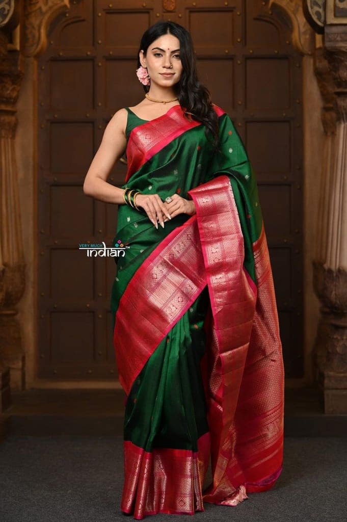 Parampara Premium ~ Gadwal Pure Silk Handloom Saree in Royal Green with Rani Pink Border