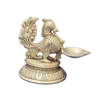 "Peacock Brass Diya Oil Lamp for Home and Temple Decor"
