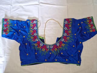 Blue Hand Embroidered Blouse With Floral Motifs