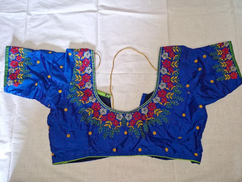 Blue Hand Embroidered Blouse With Floral Motifs