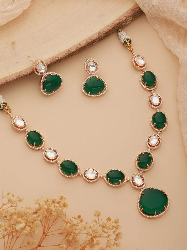 Gold Plated Emerald Green Kundan Studded Designer Luxe Bridal Jewellery Set view 4