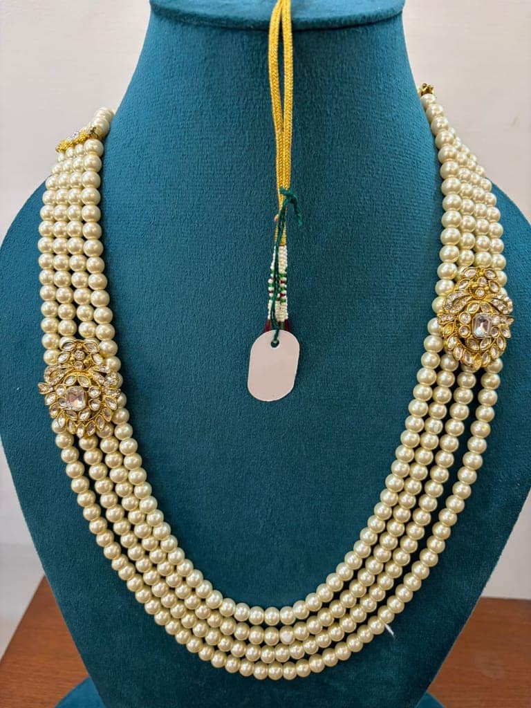 ladi cream moti swagat mala with gold side brooch