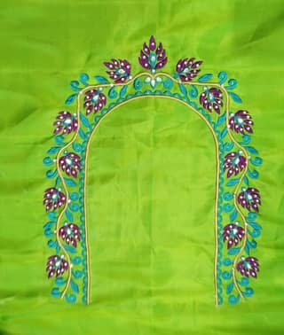 Green blouse with floral embroidery