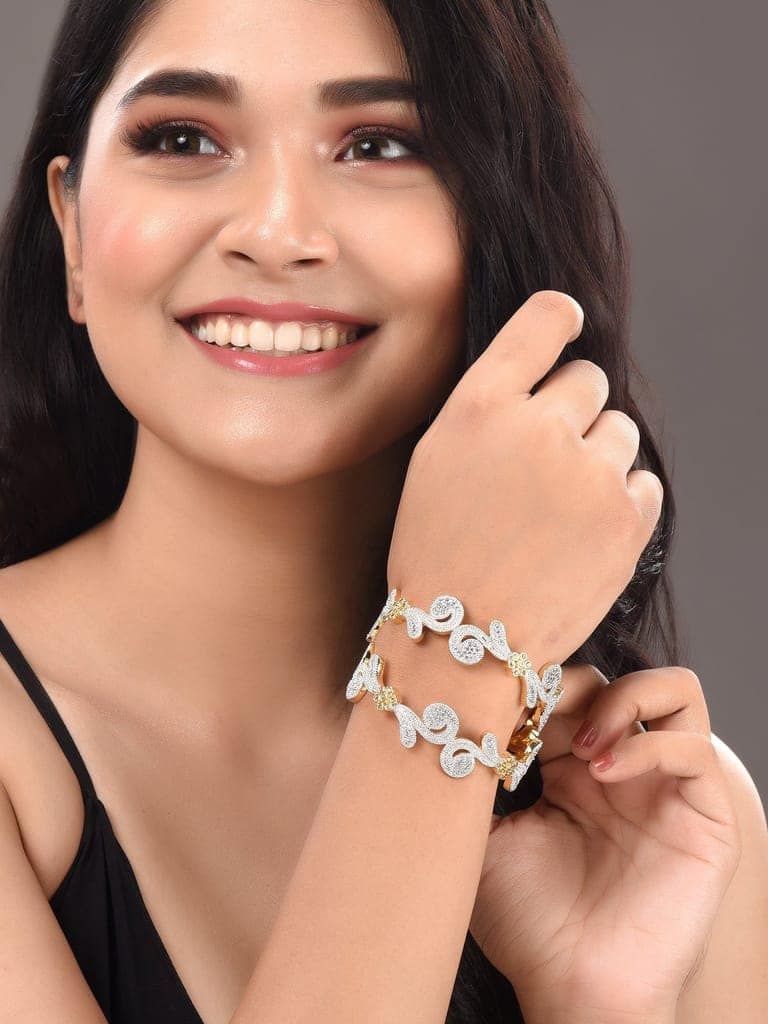 Set Of 2 Dua Toned Gold Plated Whitee AD Studded Handcrafted Leafy Design Bangles view 4