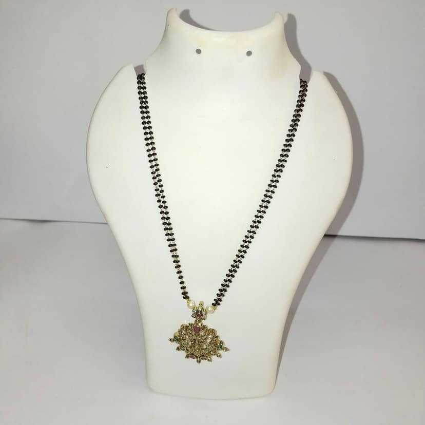 Black Beads Mangalsutra with intricate gold pendant