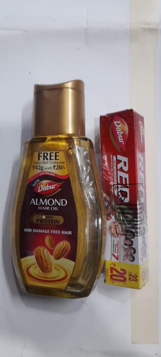 Dabur almond hair oil soya protein with free tooth paste