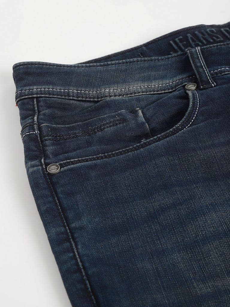 Men Indigo Tint Slim Fit Washed Mid Rise Stretchable Jeans view 7