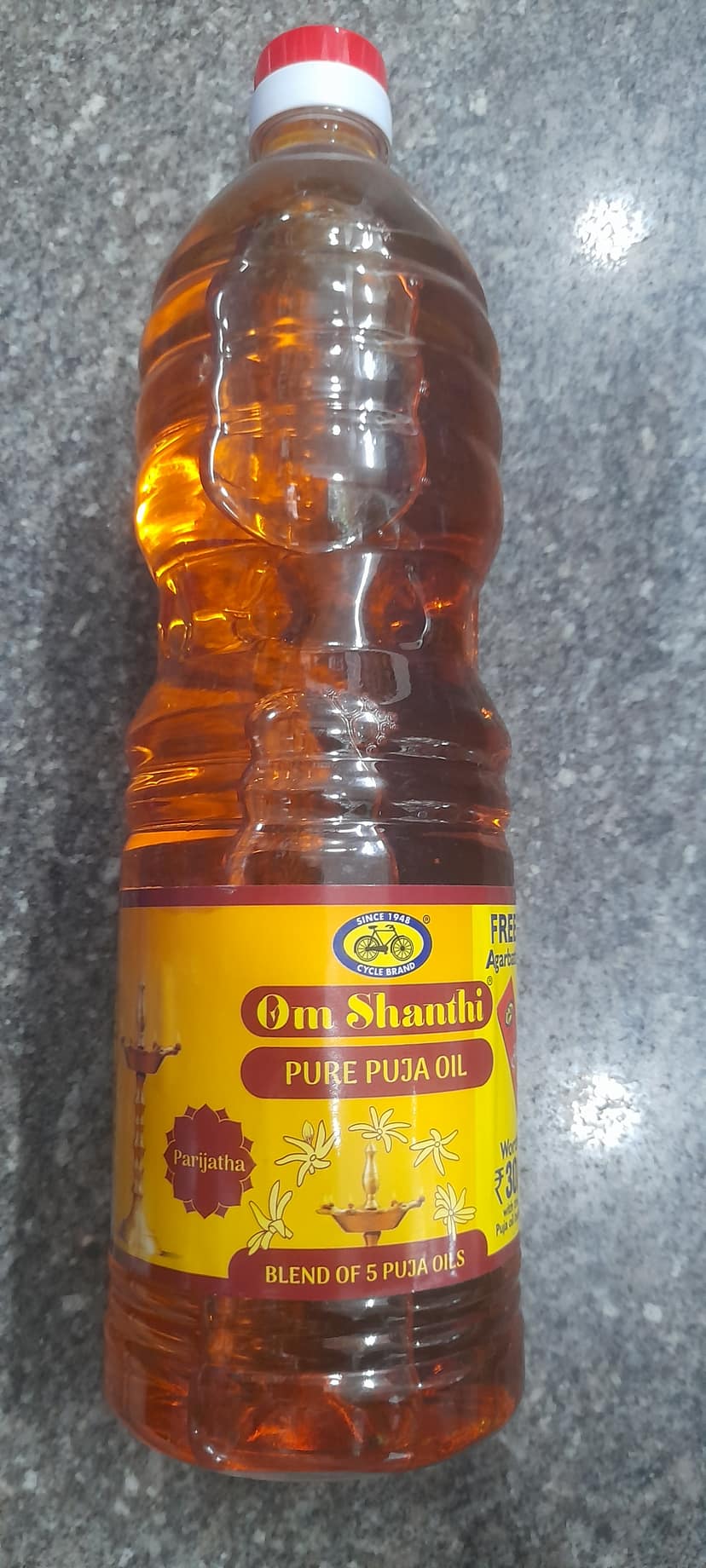 Cycle om Shanti pure Puja oil bottle