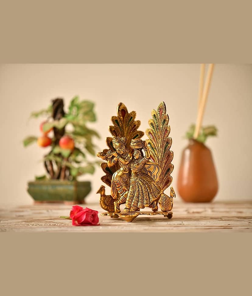 Fashion Bizz Radha Krishna Idol Statue With Diya Peacock Design Decorative Showpiece - 20 cm