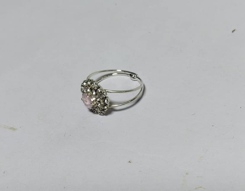 "Elegant Silver-Plated Ring with Pink Center Stone and Rhinestone Accents" view 3