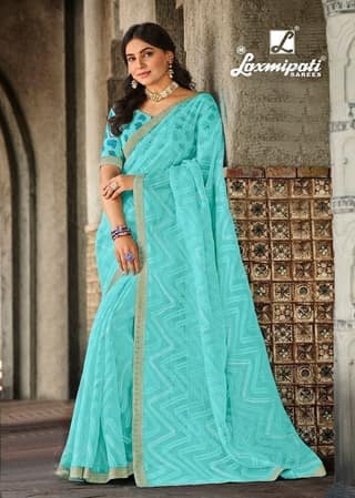 Blue Color Stone Work Brasso Printed Saree With Fancy Border And Fancy Blouse Piece