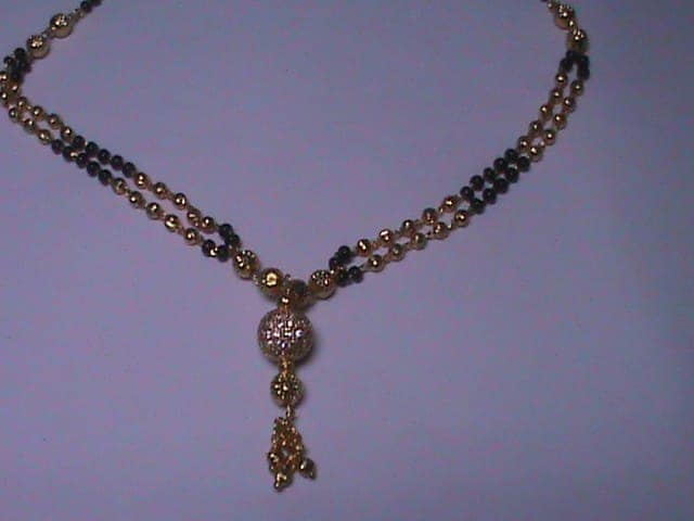 Gold Mangalsutra with Black Beads view 2