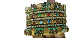 Gold Bangles with Gemstones and Diamonds