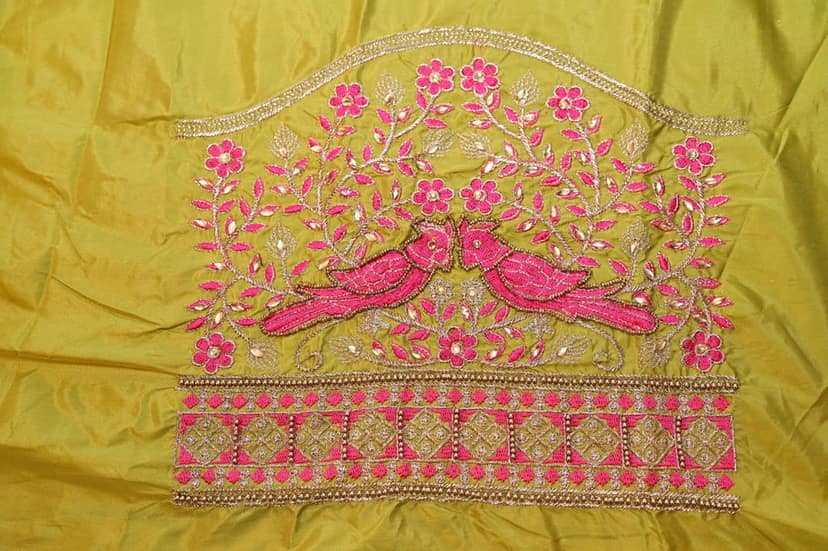 Green blouse with intricate embroidery and mirror work view 2