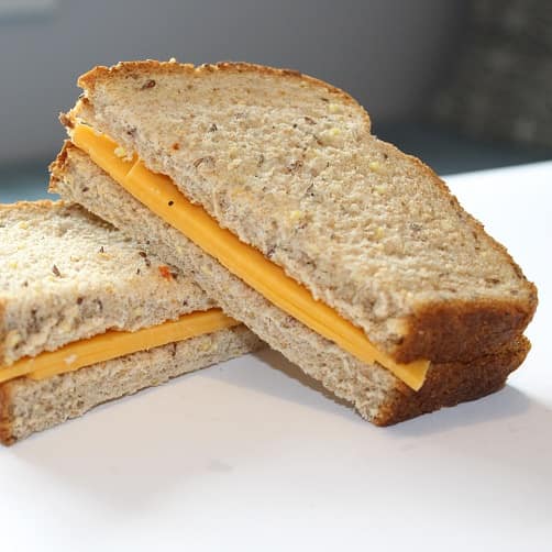 Plain cheese sandwich with chips