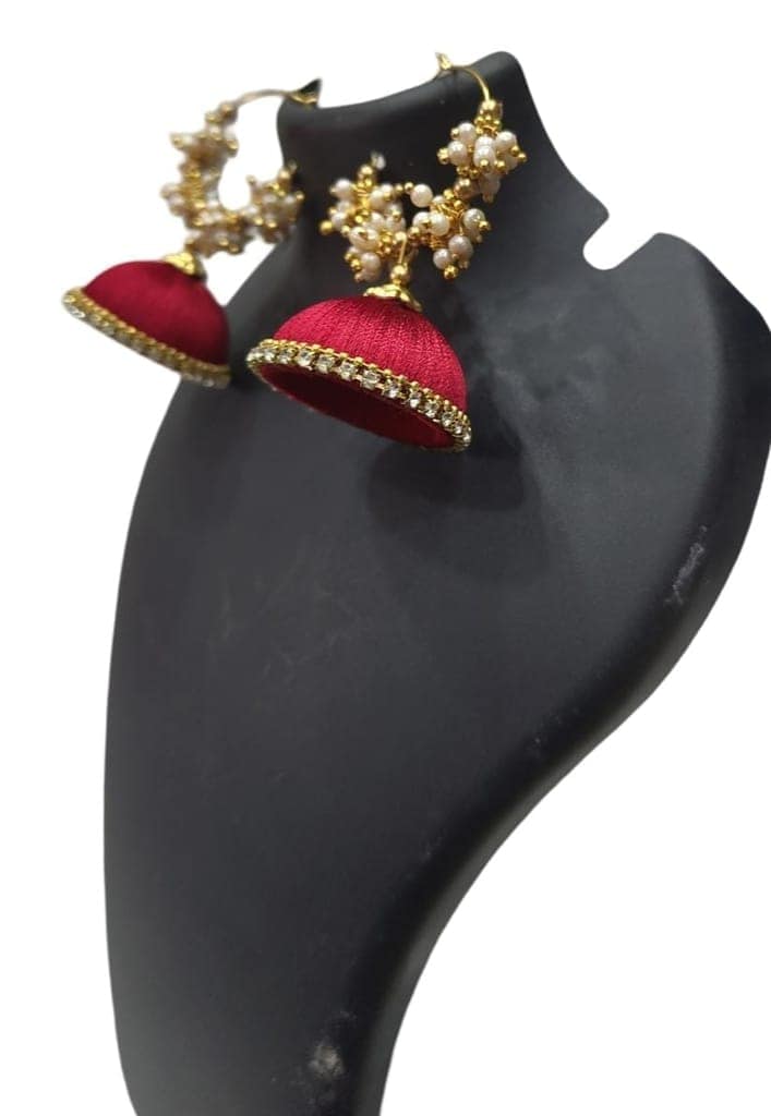 Red and gold jhumka earrings with pearl and kundan accents view 3