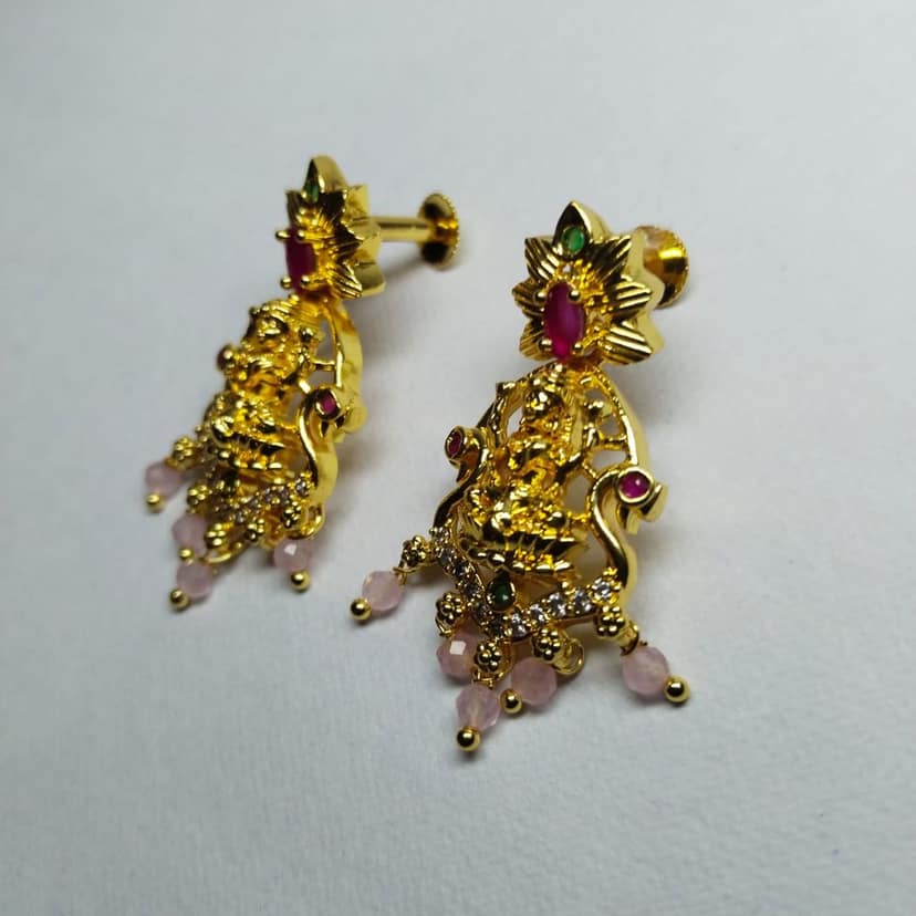Gold Goddess Lakshmi Hanging Jhumka Earrings With Ruby and White Stones view 2