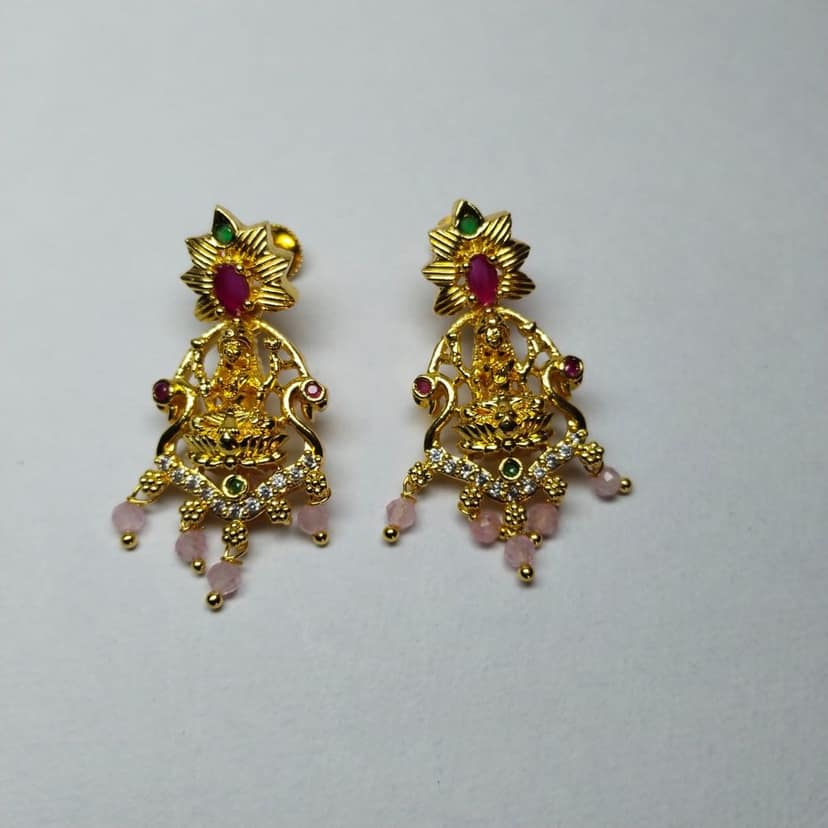 Gold Goddess Lakshmi Hanging Jhumka Earrings With Ruby and White Stones view 3