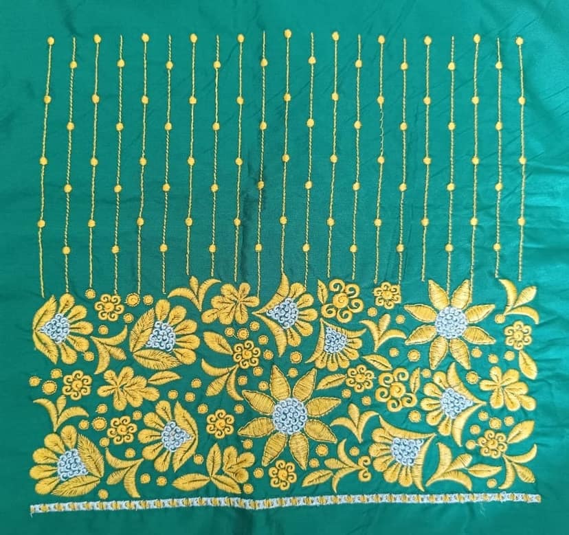 Green blouse with intricate golden embroidery view 2