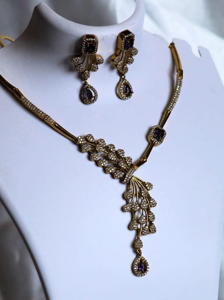 Gold Plated Kundan and Pearl Drop Earrings with Purple Stones view 3