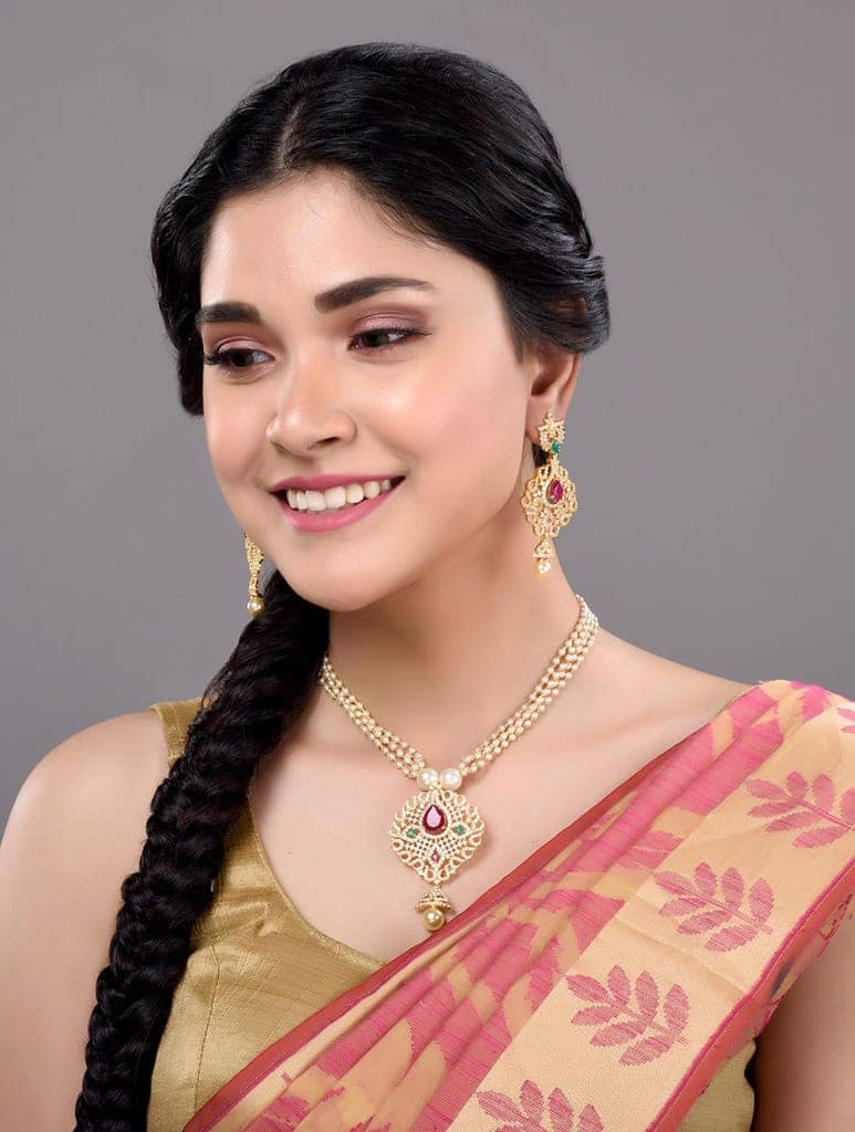 Gold Plated AD and Pearl Studded Traditional Pendant White Pearl Mala and Earrings view 9