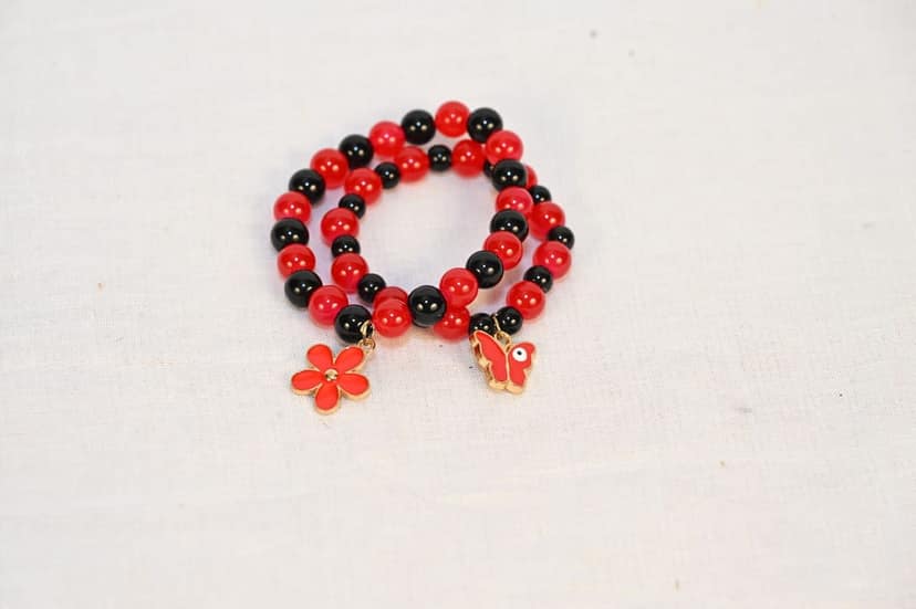 Red and black beaded charm bracelet view 2
