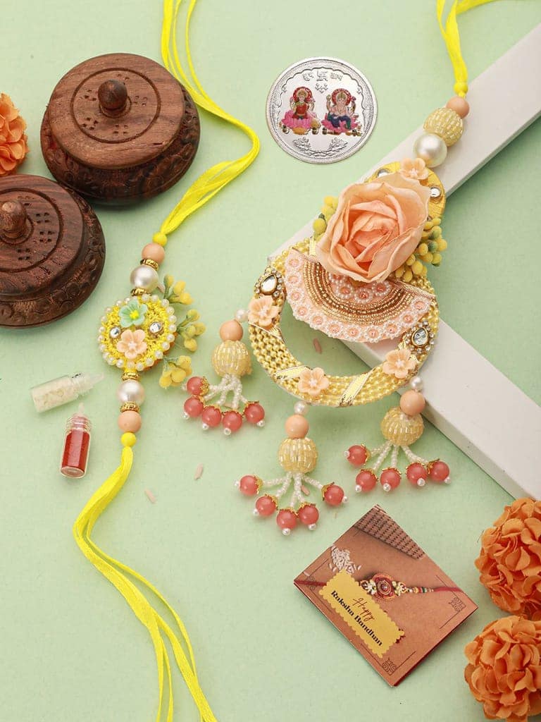 Set of 2 Peach Handcrafted Flower Rakhi for Bhaiya & Bhabhi Lumba Rakhi Set With 999 Silver Lakshmi & Ganeshji 10 gram Colour Silver Coin