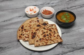 1 aloo paratha with mushroom masala [200 ml]