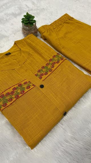 Women's Maroon Embroidered Cotton Blend Straight Kurti With Pant