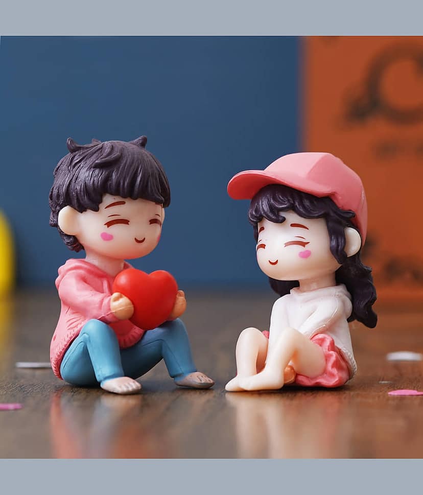 eCraftIndia Multicolor Resin Couple Figurine