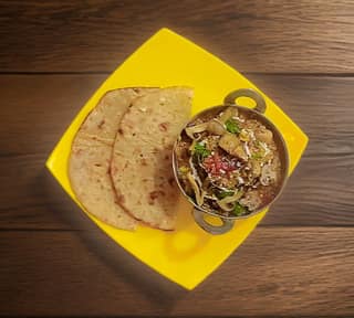 Kadai mushroom [200 ml] with 1 garlic roti