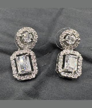 Charms White Stud Earrings ( Pack of 1 )