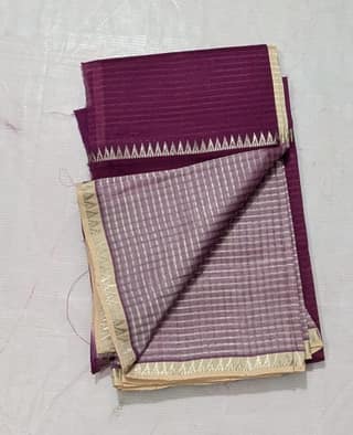 A beautiful and elegant handloom cotton saree with zari border in purple color