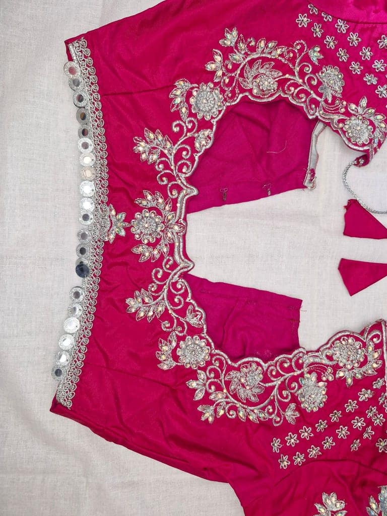 Embroidered magenta pink silk blouse with silver zari work