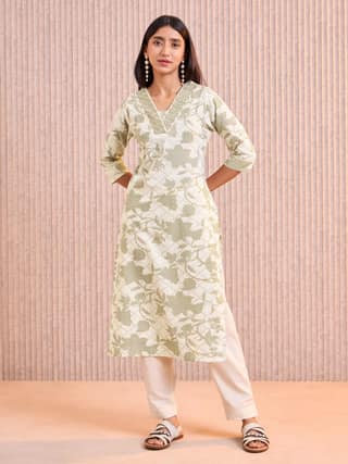 Ivory And Green Cotton Flax Foil Printed Kurti With Embroidery & Lace Detailing